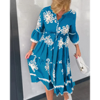 Romy - Bloemenjurk Met 3/4 Mouwen En Elegante Details
