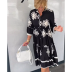 Romy - Bloemenjurk Met 3/4 Mouwen En Elegante Details