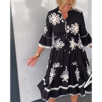Romy - Bloemenjurk Met 3/4 Mouwen En Elegante Details