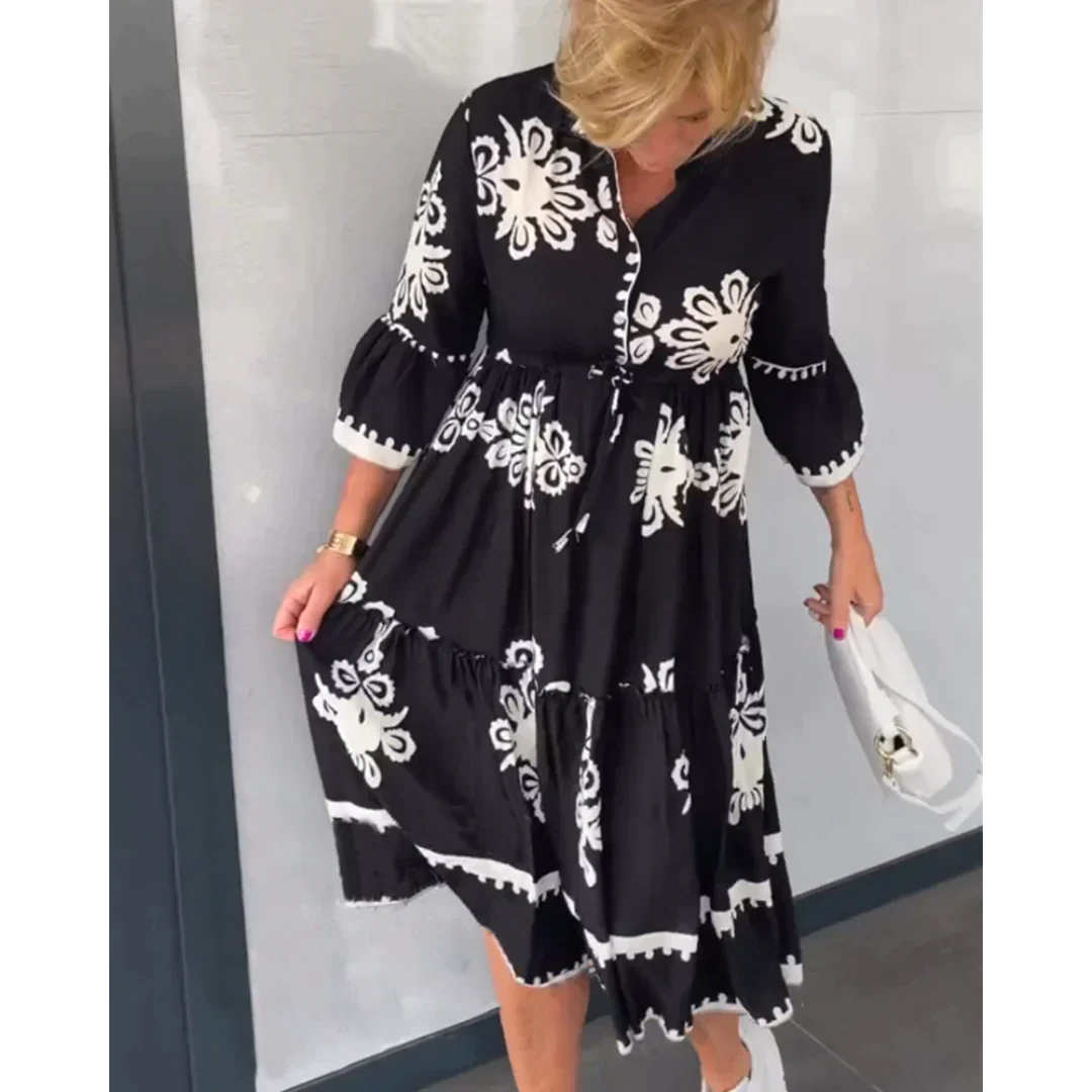 Romy - Bloemenjurk Met 3/4 Mouwen En Elegante Details