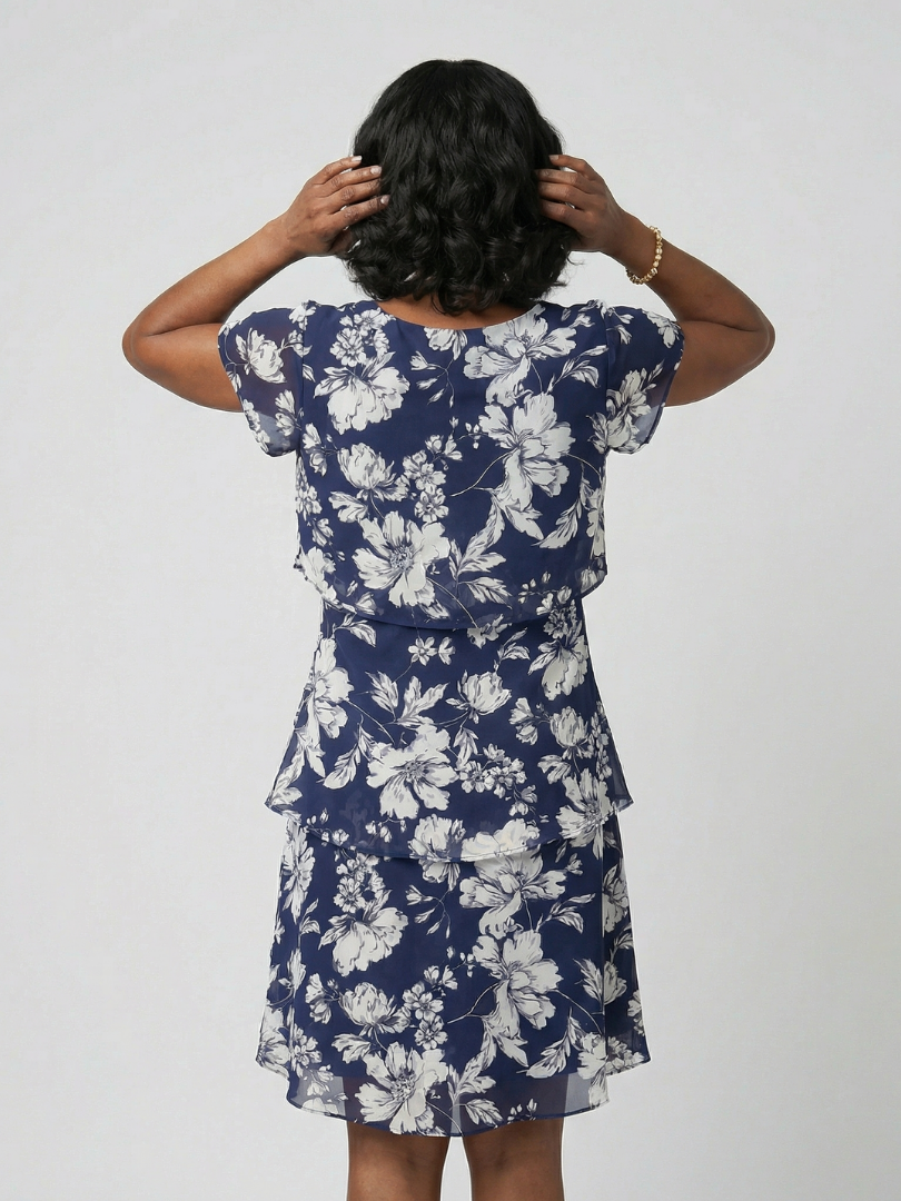 Thea | Subtiele Bloemenjurk tot de Knie