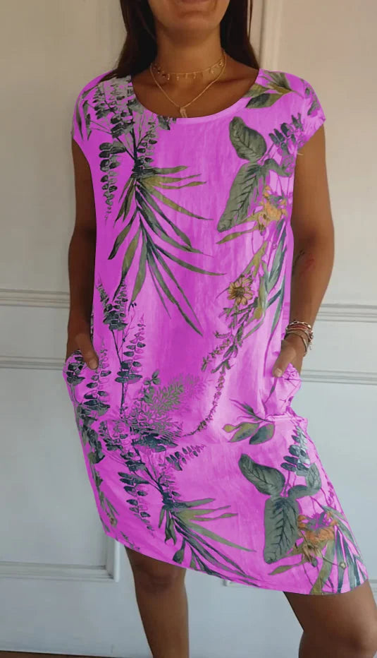 Britt - Bedrukte zomerjurk met ronde hals en luchtige pasvorm