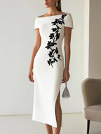 Audrey | Chique Bloemenprint Boot Neck Midi Jurk Outfit
