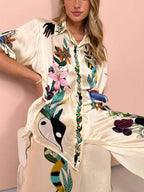 Nika | Resort Vibes Satin unieke print shirt & broek set Pasvorm