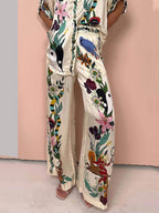 Nika | Resort Vibes Satin unieke print shirt & broek set Pasvorm