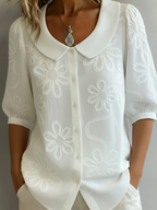 Aurélie — Lichte gebloemde blouse met natuurlijke elegantie